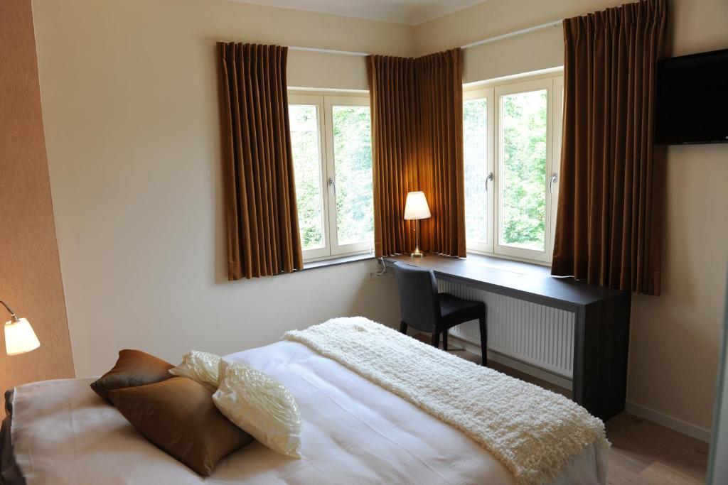 Charmehotel Villa Saporis Хаселт Стая снимка